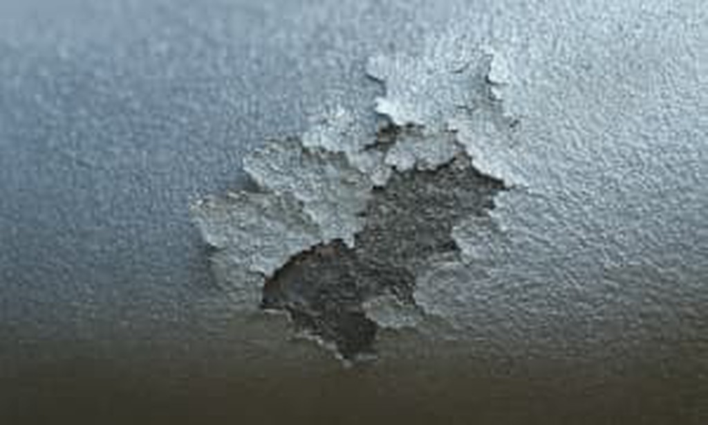 Side-by-side comparison photos of common plating defects including burning, pitting, and peeling