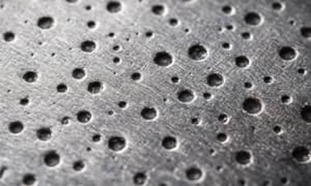 Side-by-side comparison photos of common plating defects including burning, pitting, and peeling